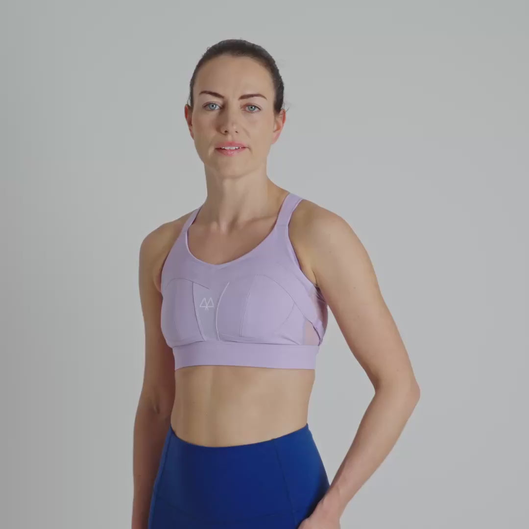Lavender sports bra with a MAAREE logo on a neutral background